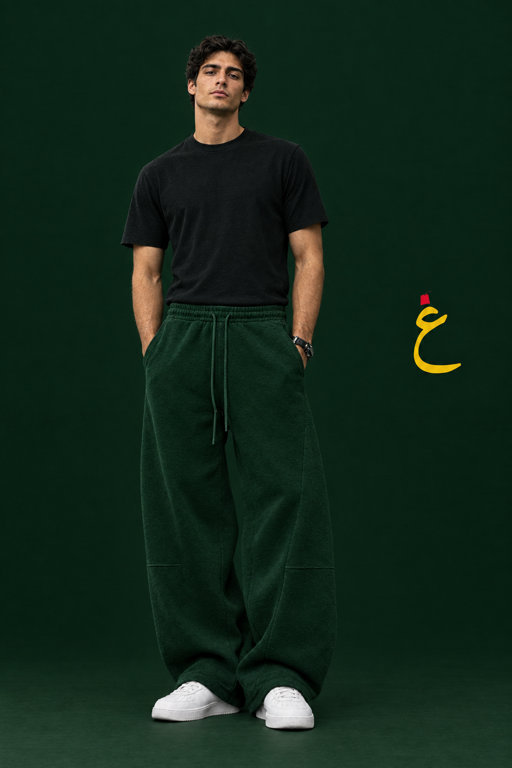 GHAREEB green sweatpants worn by a model