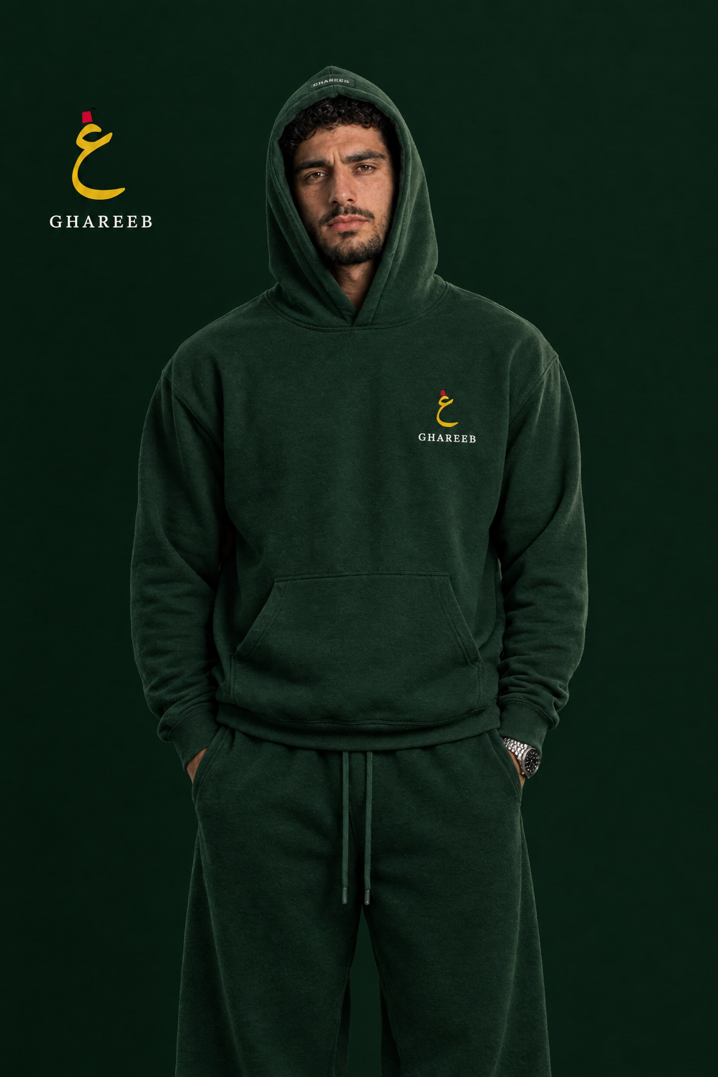 GHAREEB green hoodie worn by a model